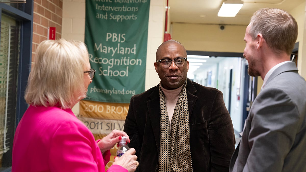 Dr. Wright speaking with Superintendent House