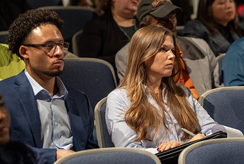 attendees-listening-at-Education-Marketplace-presentation