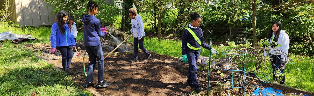 students-working-on-garden