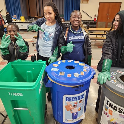 PD-students-with-recycling-and-trash-bins.jpg