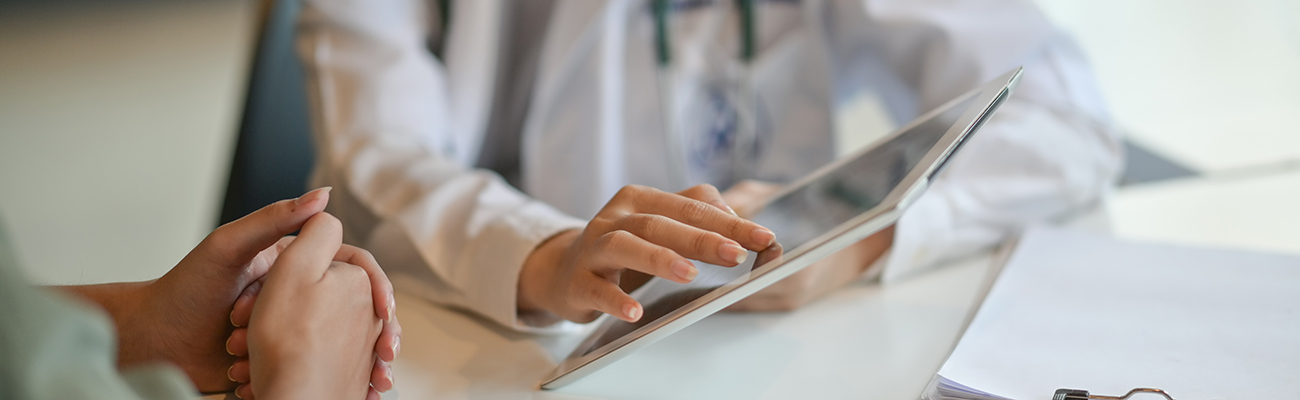 H-health-worker-with-tablet.jpg