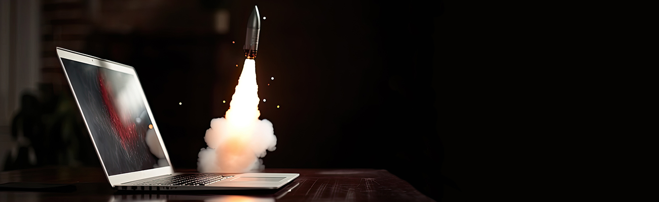 rocket launching from an open laptop