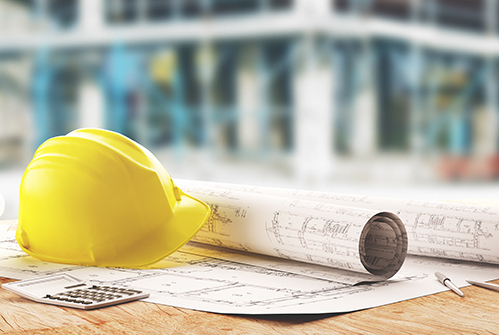 M-construction-hat-and-blueprints.jpg