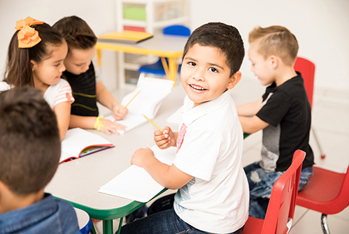 preschool-students-at-table-working