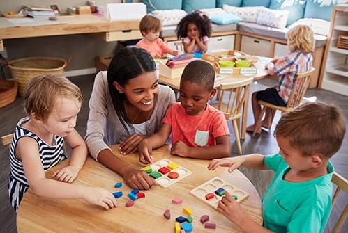 M-preschool-students-with-teacher.jpg