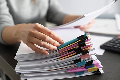 M-stack-of-paper-documents.jpg