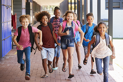 M-students-running-outside-of-school.jpg