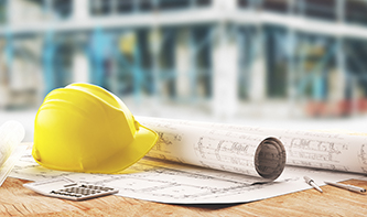 T-construction-hat-and-blueprints.jpg