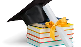 T-graduation-cap-with-books.jpg