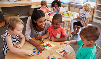 T-preschool-students-with-teacher.jpg
