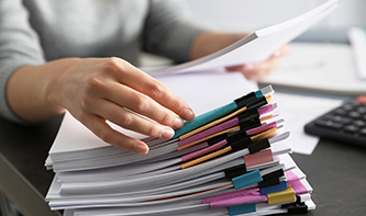 T-stack-of-paper-documents.jpg