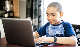 T-student-on-computer.jpg