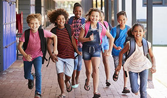 T-students-running-outside-of-school.jpg